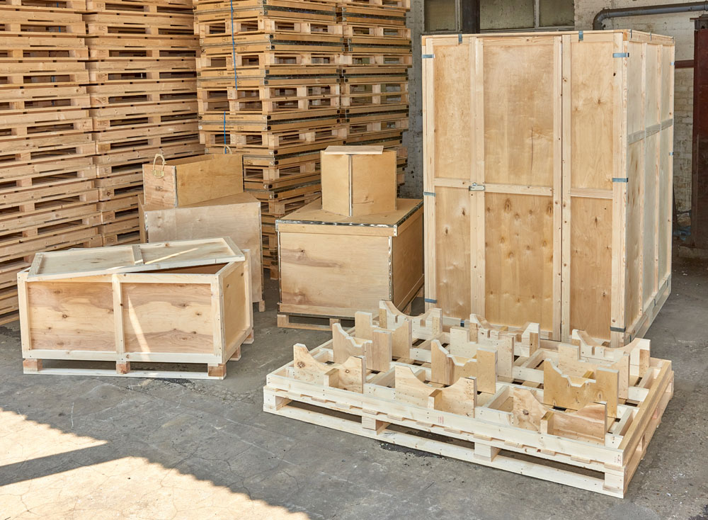Large selection of different wooden crates, cases and pallets
