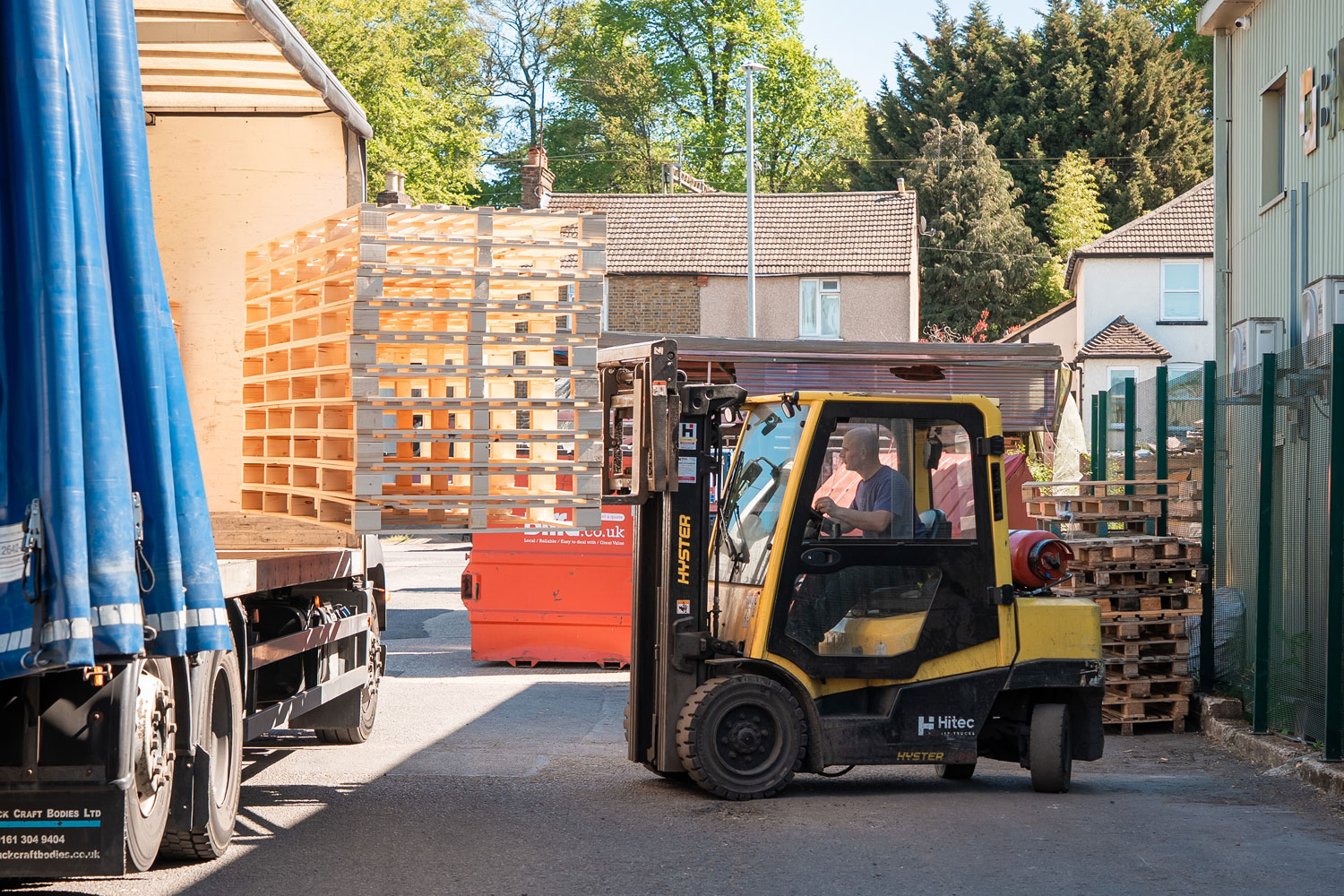 Forklift truck loading pallets