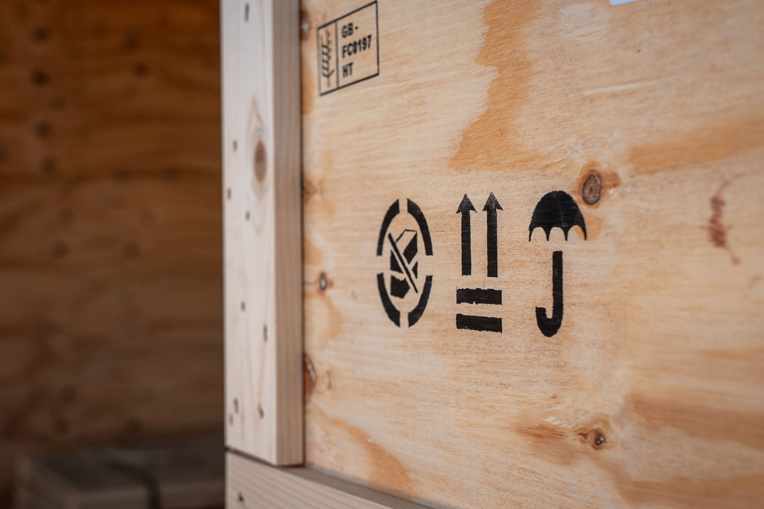 Symbols printed onto a wooden crate